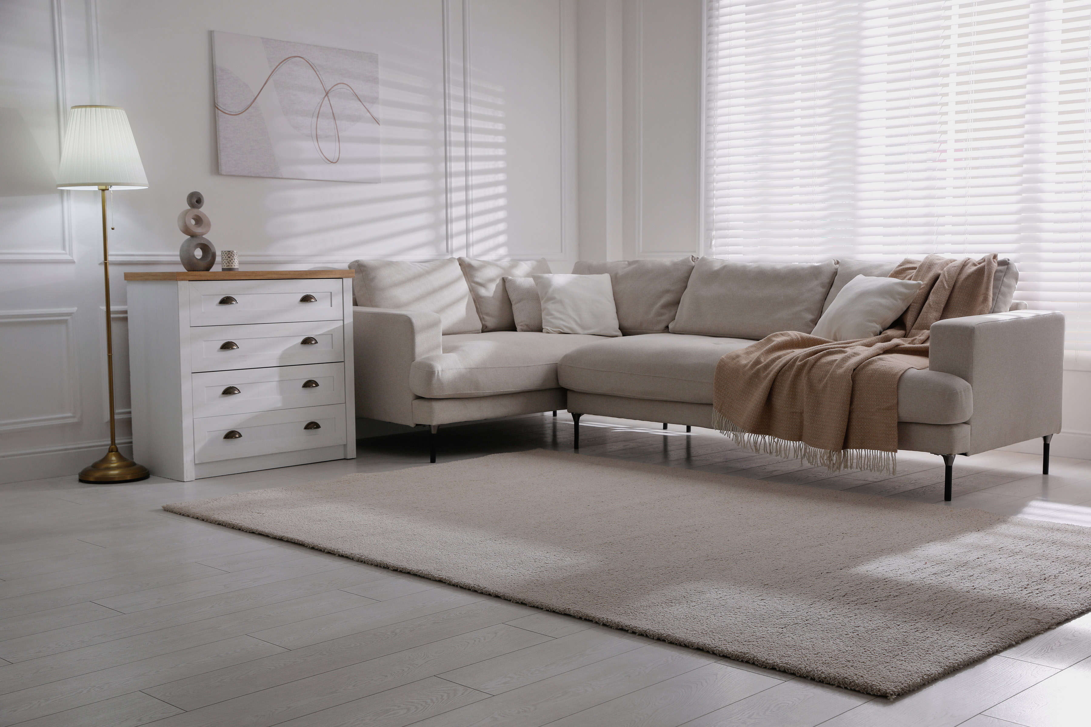 neutral colored livingroom with couch and love seat